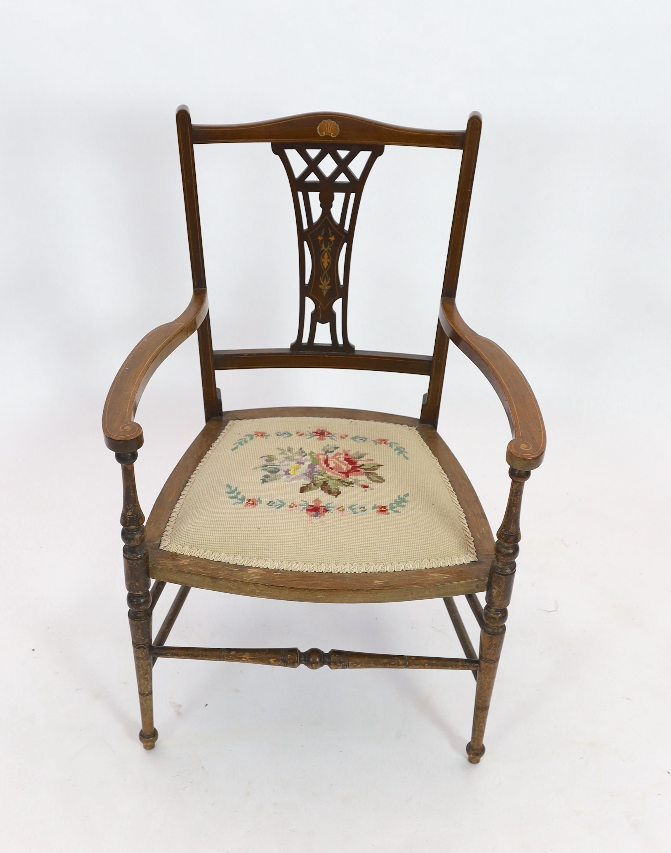 An Edwardian inlaid mahgany elbow chair